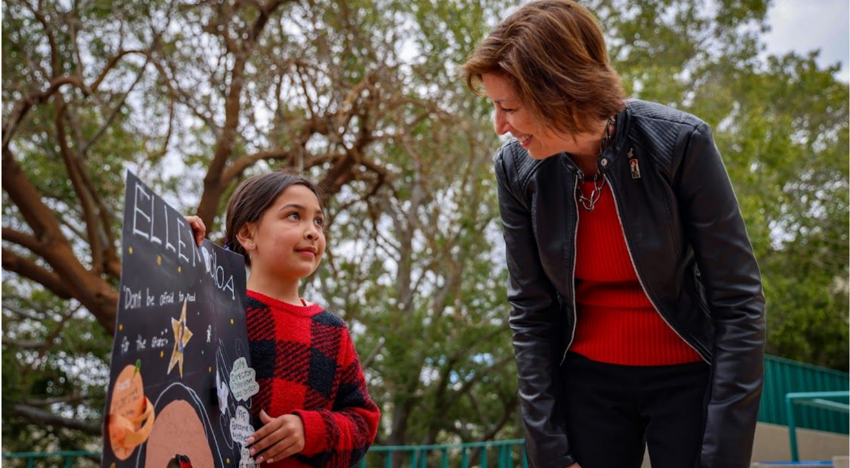 Ellen Ochoa, right, meets with a young aspiring scientist during SDSU